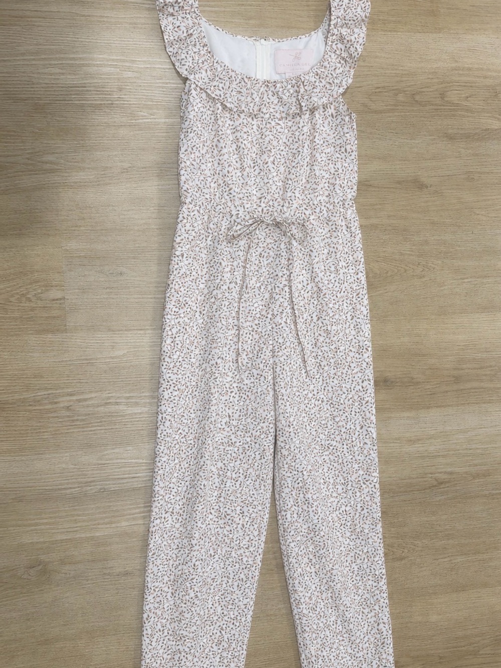 Sleeveless Pink Floral Ruffle-Neck Jumpsuit with Tie Waist